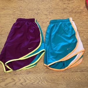 Two pairs of Nike Tempo running shorts